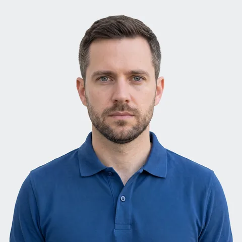 Acceptable photo: neutral expression, light background